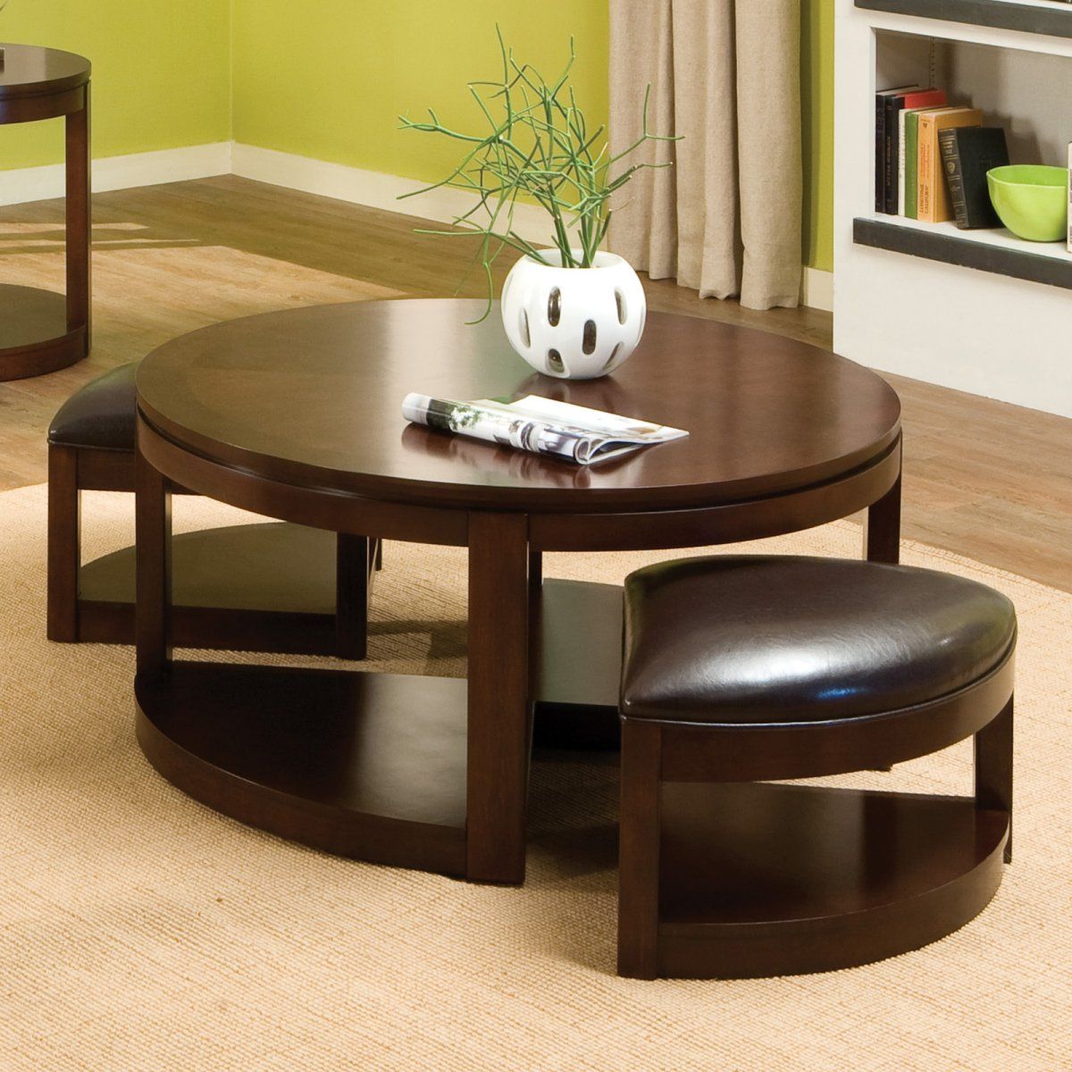 Affordable Round Coffee Tables Colored In Brown Made Of Wooden Material With Brown Chair Round Coffee Table With Storage Ottomans (View 1 of 10)
