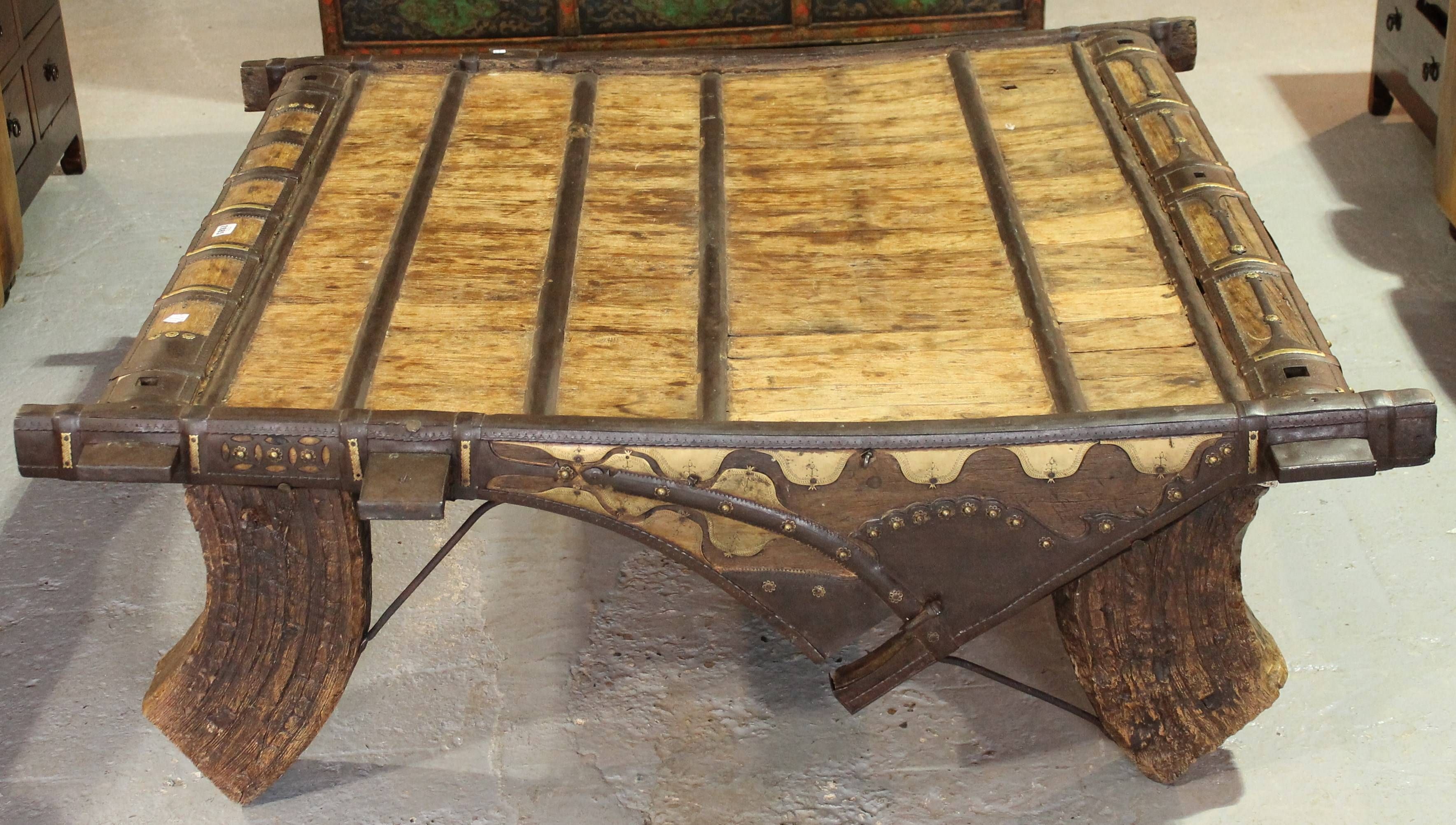 A 19th Century Iron Bound Hardwood Coffee Table/ Elephant Saddle With Regard To Elephant Coffee Tables (Photo 26 of 30)