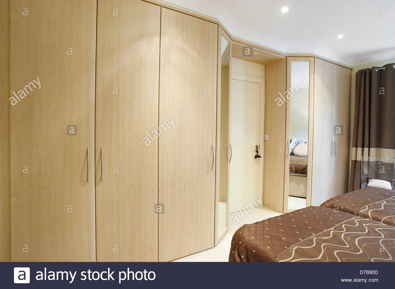 A Bedroom With Fitted Wooden Wardrobes In A House In The Uk Stock With Regard To Fitted Wooden Wardrobes (Photo 1 of 30)