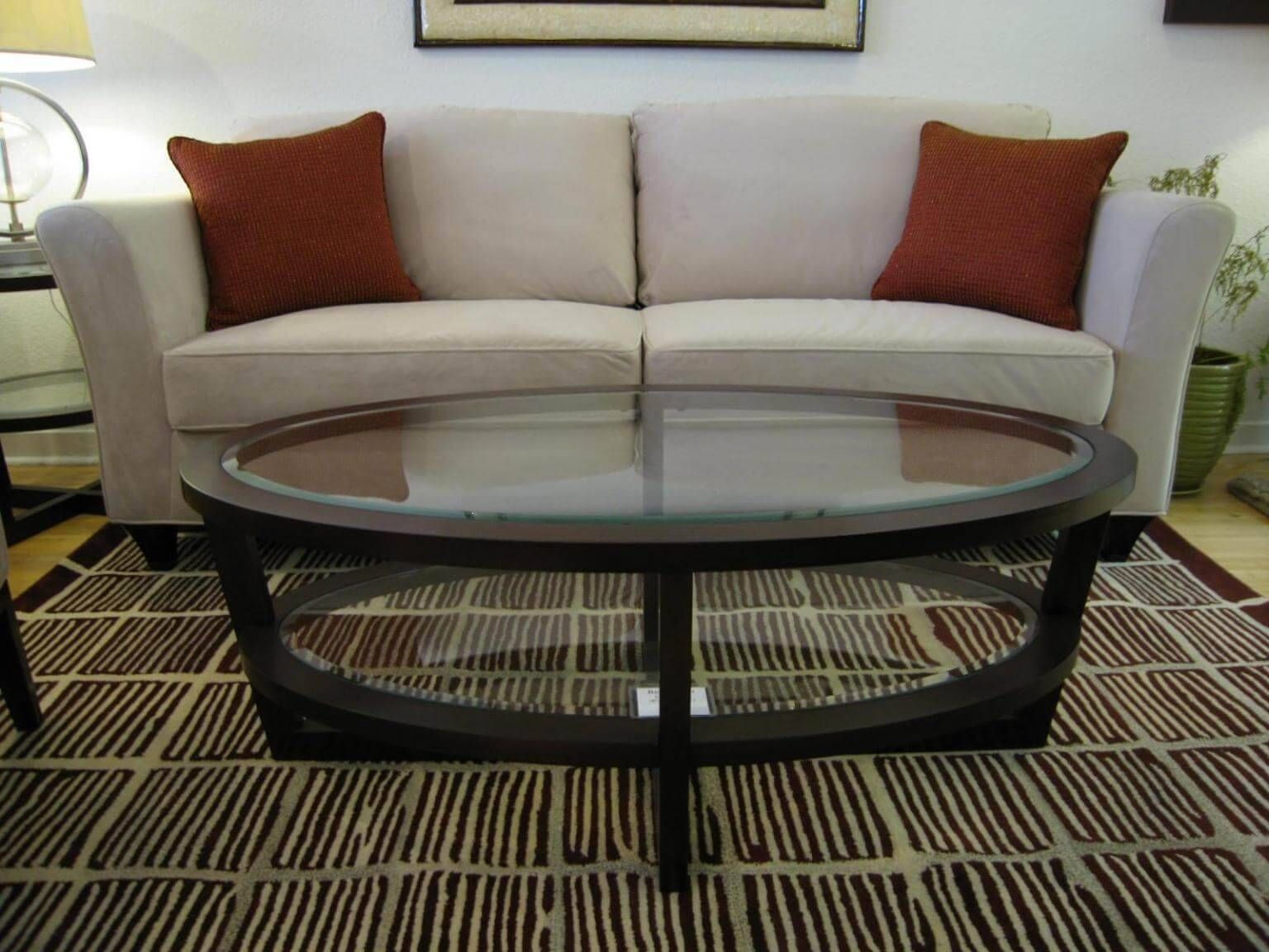 30 Collection of Oval Glass and Wood Coffee Tables