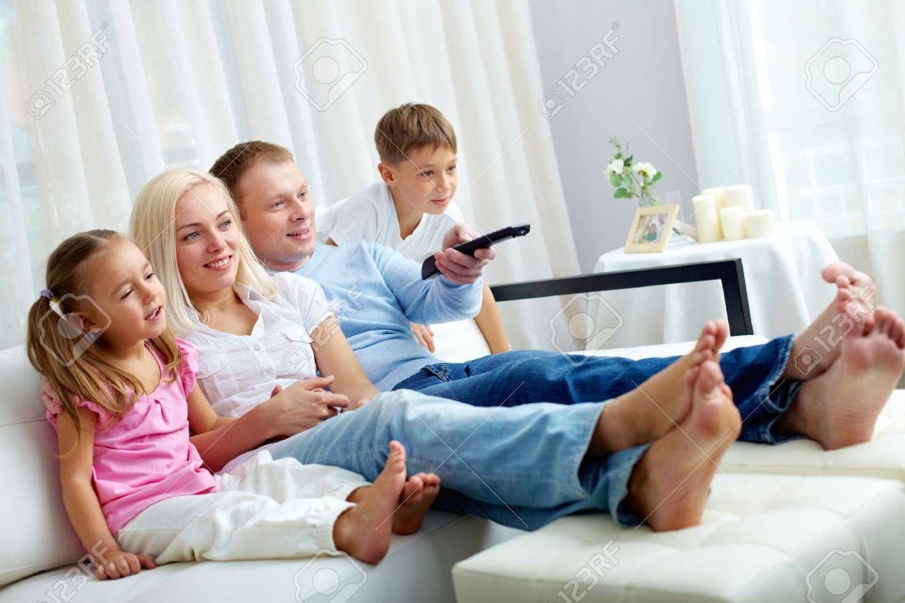 Portrait Of Happy Family With Two Children Sitting On Sofa And Within Family Sofa (Photo 7 of 30)