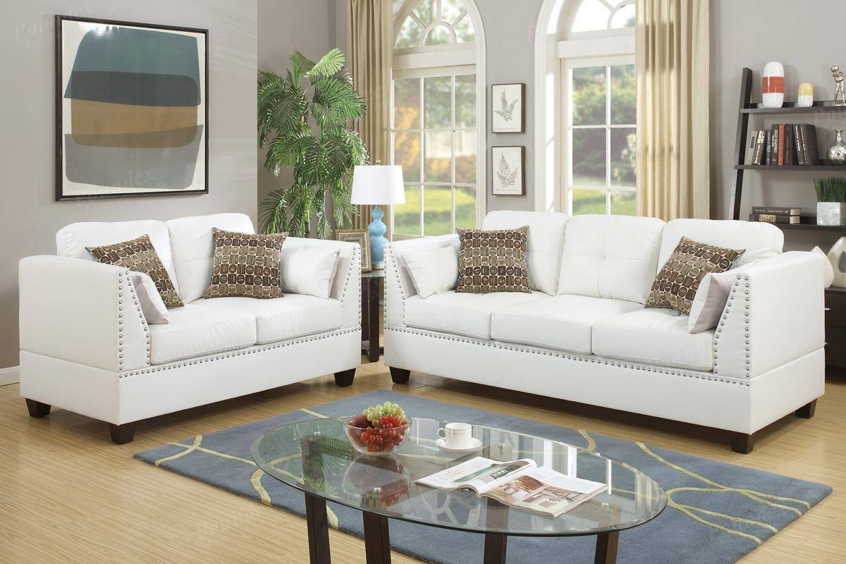 living room with off white leather sofa