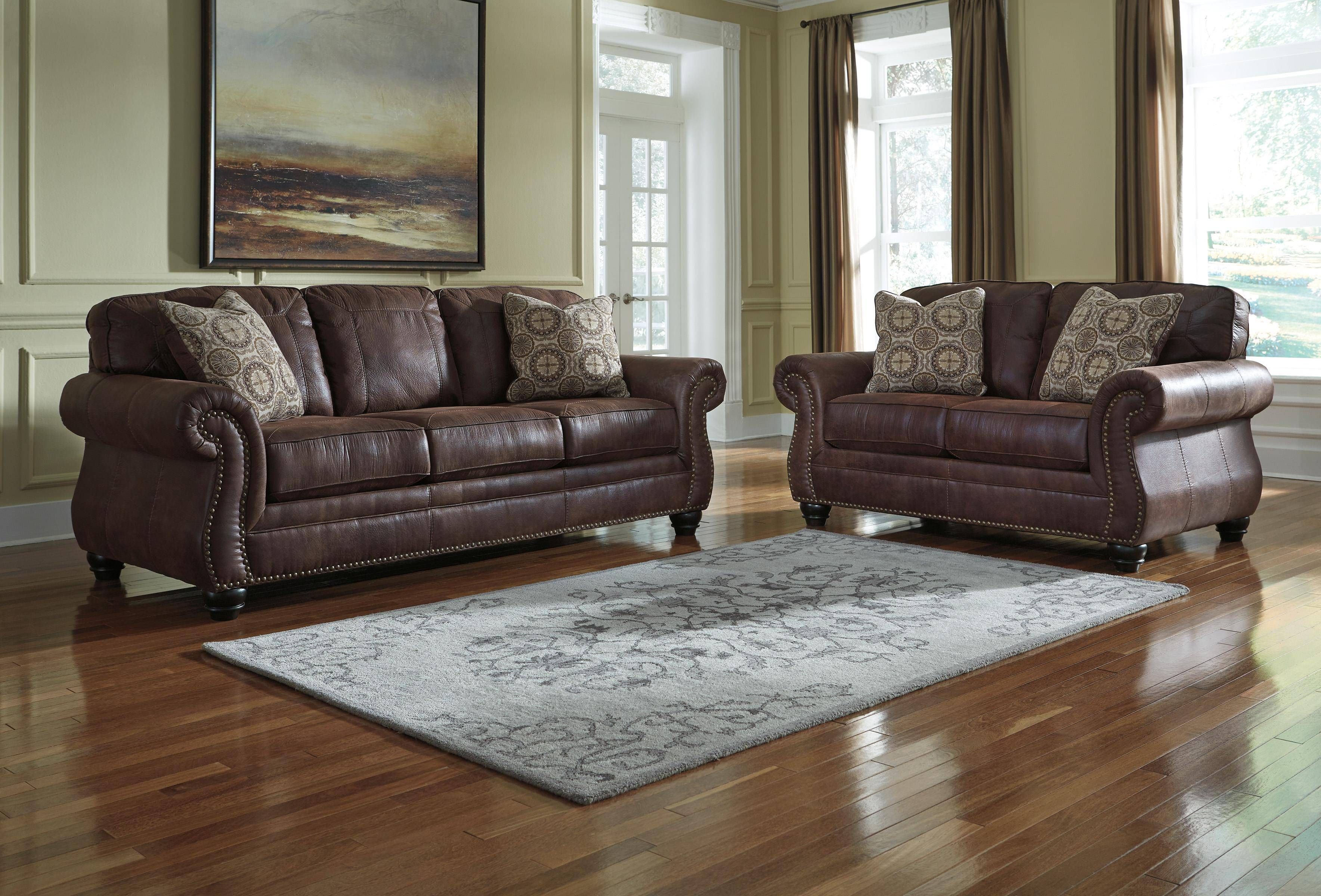 Faux Leather Sofa With Rolled Arms And Nailhead Trimbenchcraft Throughout Benchcraft Leather Sofas (Photo 4 of 15)
