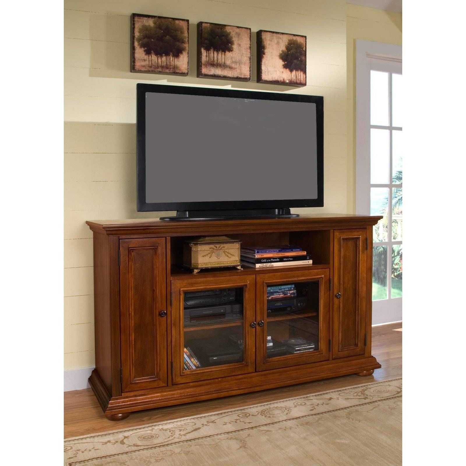 Rectangle Black Flat Screen Tv Over Brown Wooden Cabinet With Within Wooden Tv Cabinets (View 7 of 15)