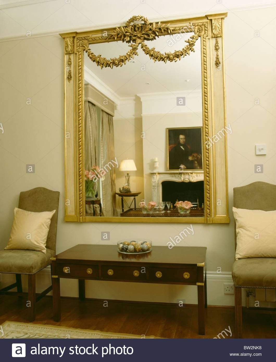 Large Ornate Gilt Antique Mirror On Wall Above Console Table In In Ornate Gilt Mirrors (View 2 of 15)