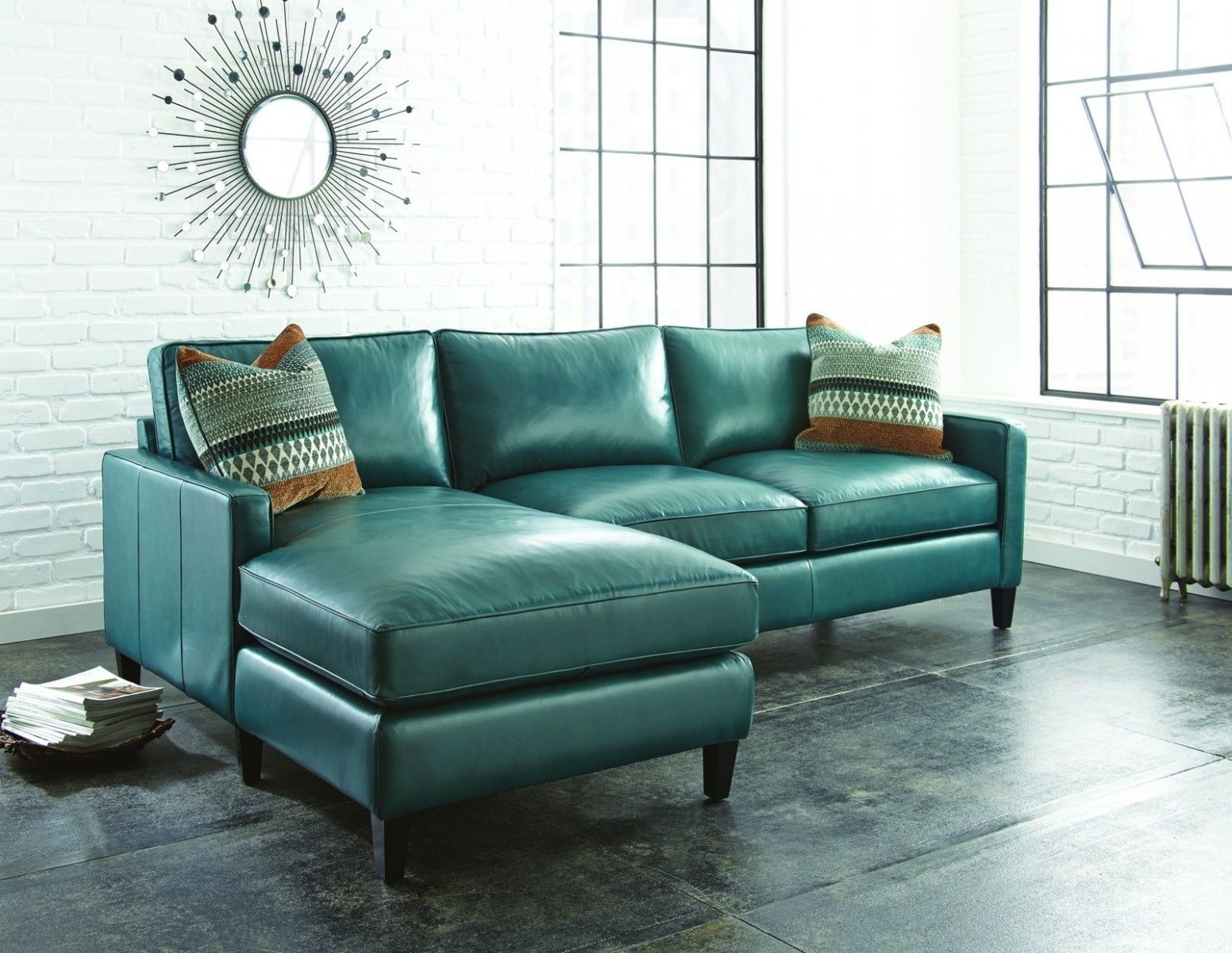 living room with aqua sofa