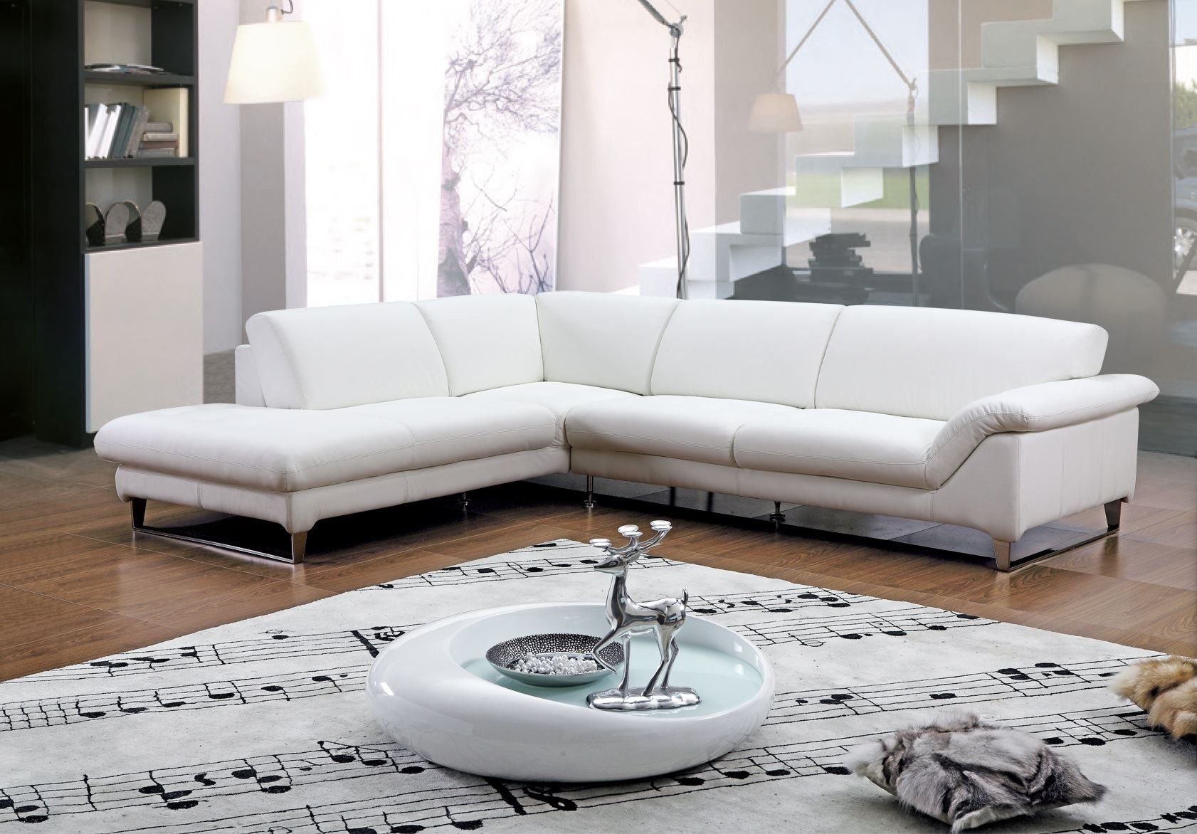 White Leather Sofa With Short Silver Steel Legs On The Brown Wooden Inside White Leather Corner Sofas (Photo 5 of 10)