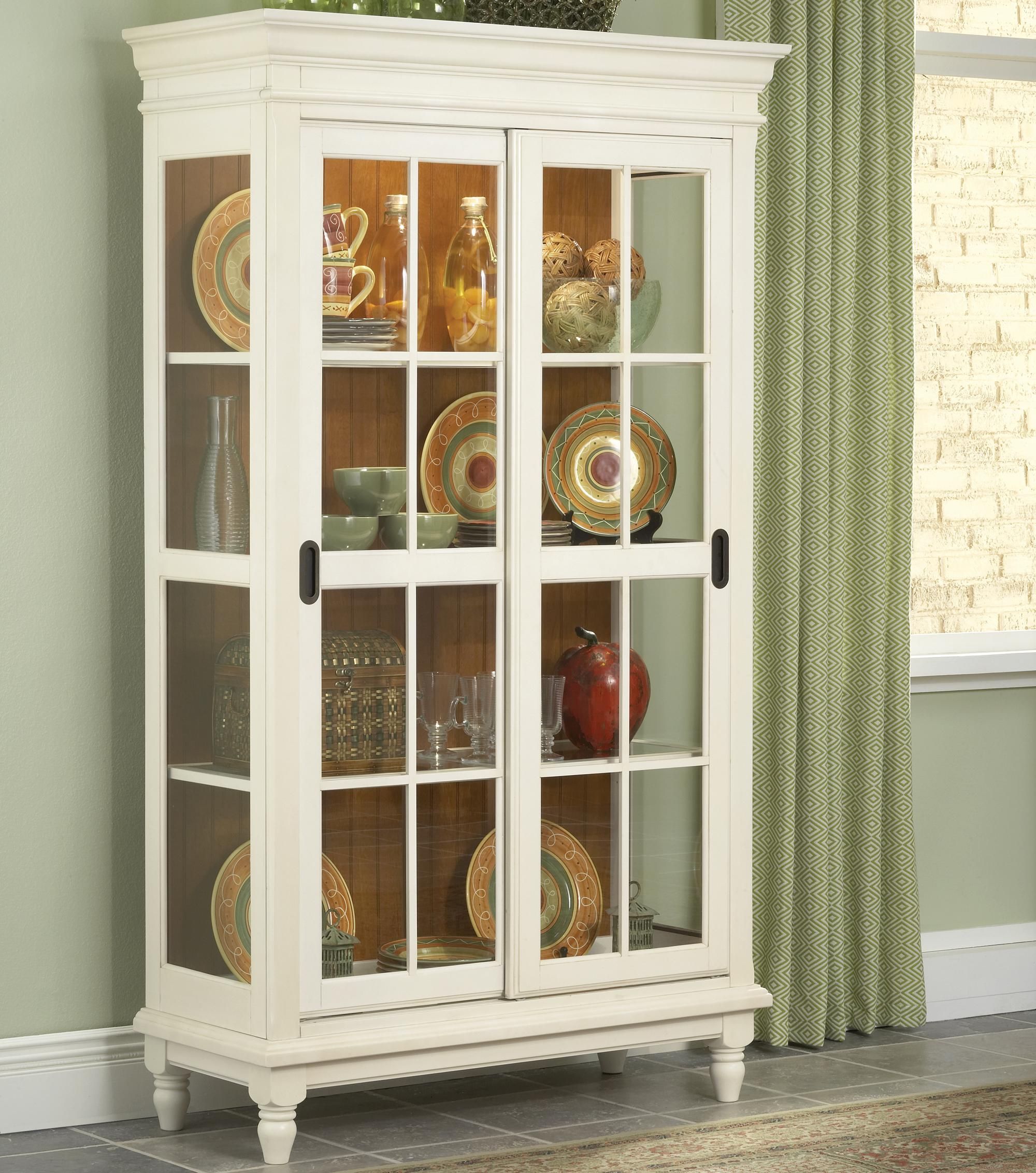 Curio Cabinet With Crown Moulding, Turned Feet, And Sliding Throughout Wooden Curio Buffets With Two Glass Doors (View 30 of 30)