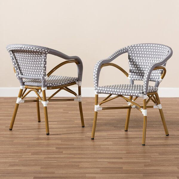Artressia Stacking Bamboo Patio Dining Armchair With Cushion Within Artressia Barrel Chairs (Photo 2 of 20)
