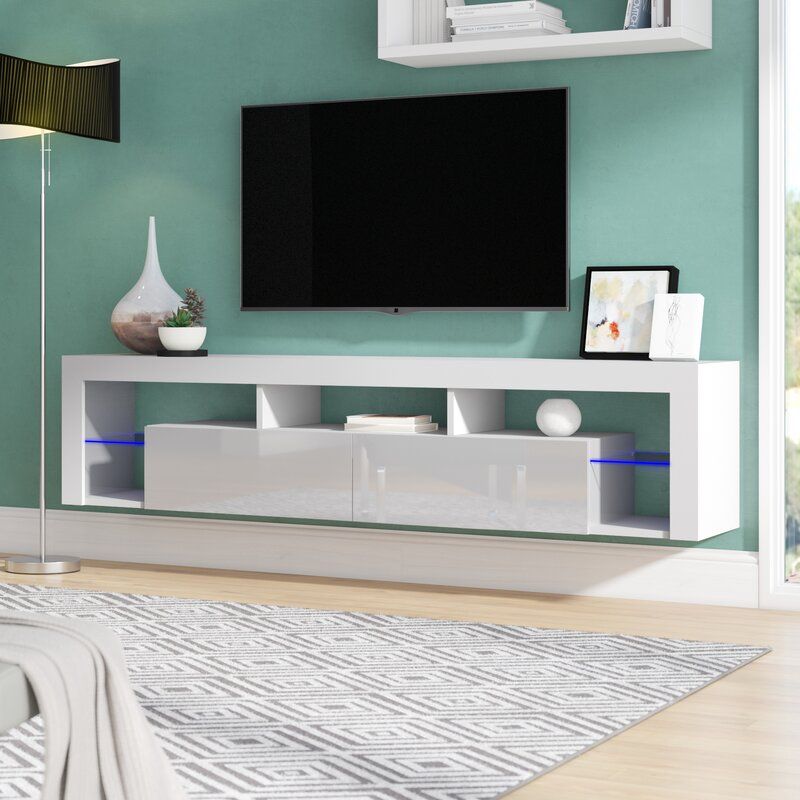 Orren Ellis Floating Milano Floating Tv Stand For Tvs Up Regarding Milano White Tv Stands With Led Lights (View 7 of 15)