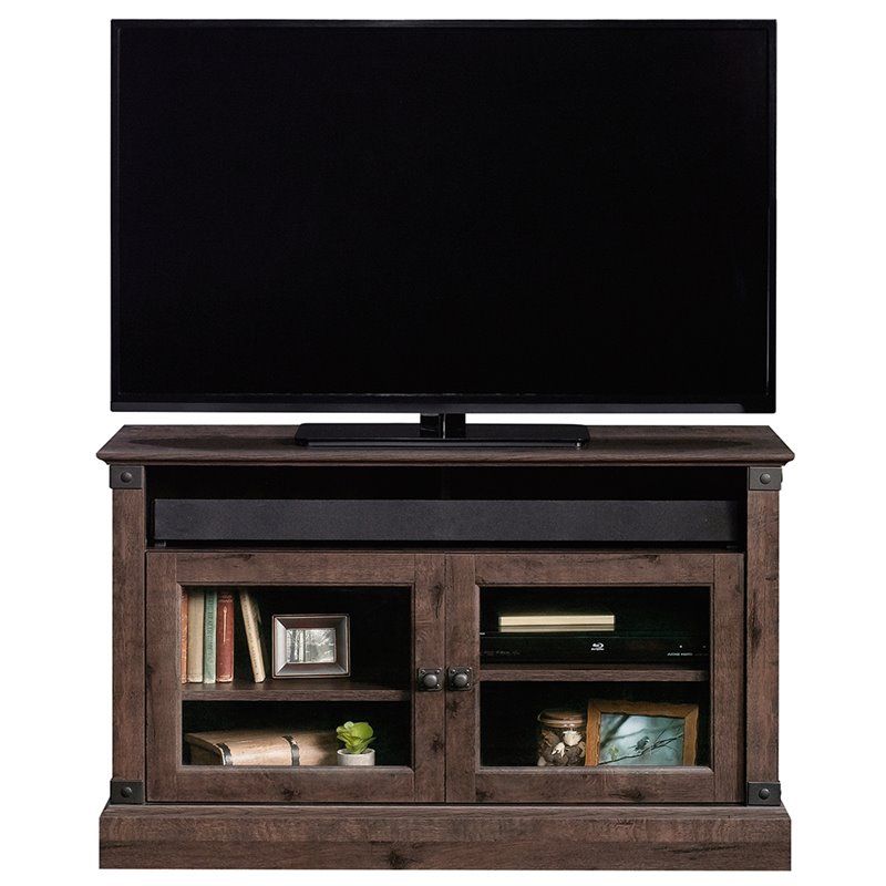 Sauder Carson Forge Panel 43" Tv Stand In Coffee Oak – 422036 Intended For Carson Tv Stands In Black And Cherry (View 1 of 15)