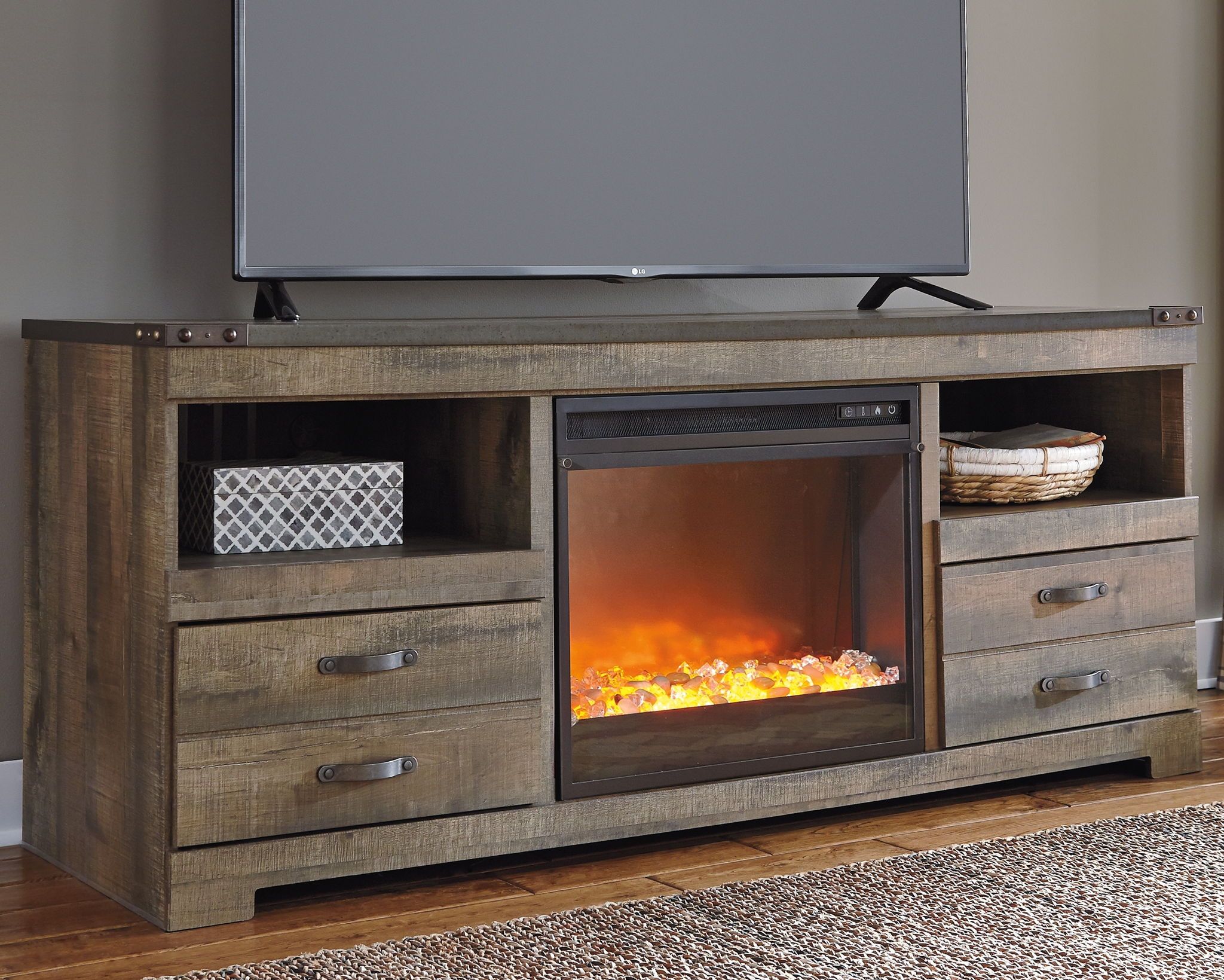 Trinell – Brown – Lg Tv Stand With Fireplace Insert Glass Throughout Dark Brown Corner Tv Stands (View 5 of 15)