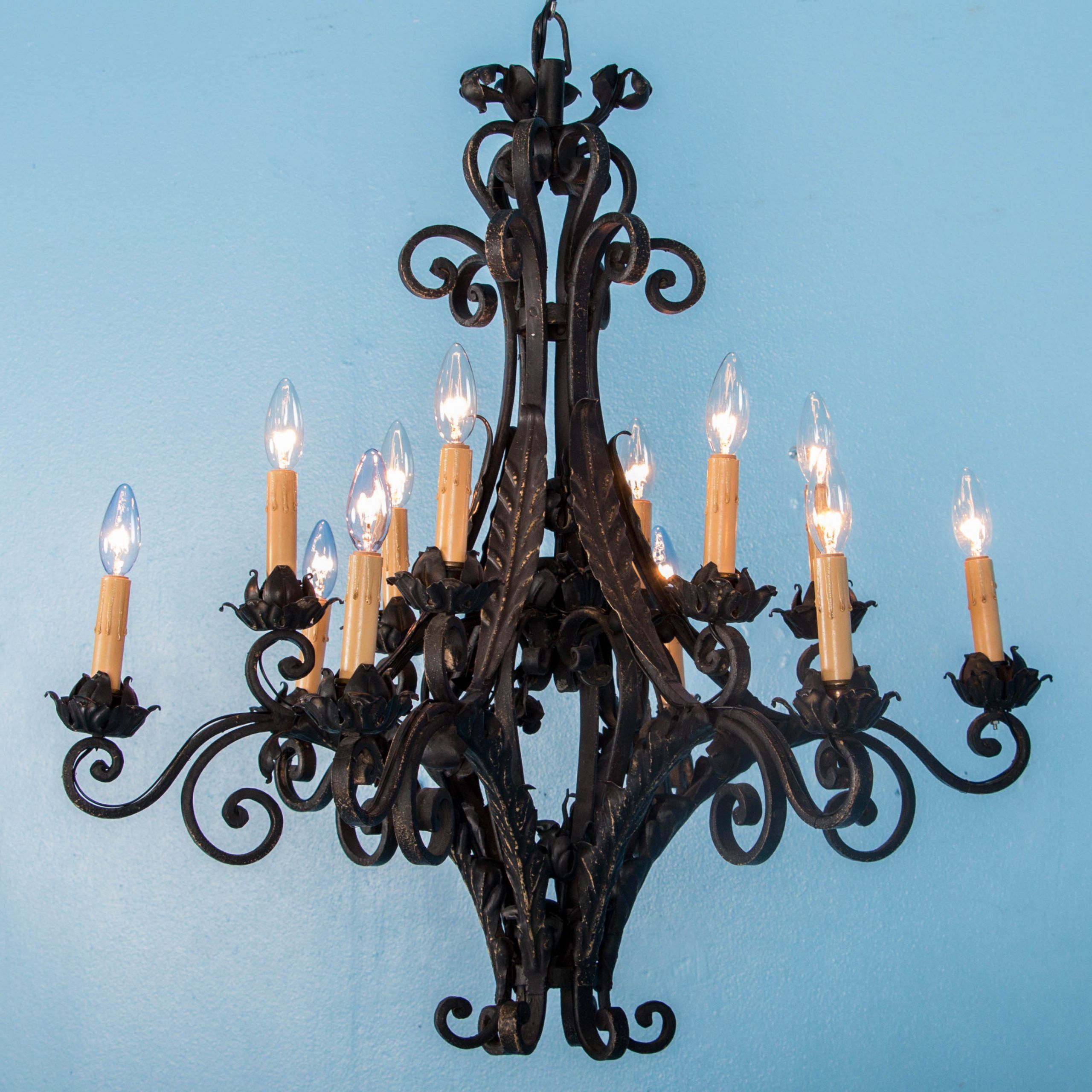 Antique 12 Light Scrolled Black Iron Chandelier Intended For Black Iron Eight Light Minimalist Chandeliers (View 9 of 15)