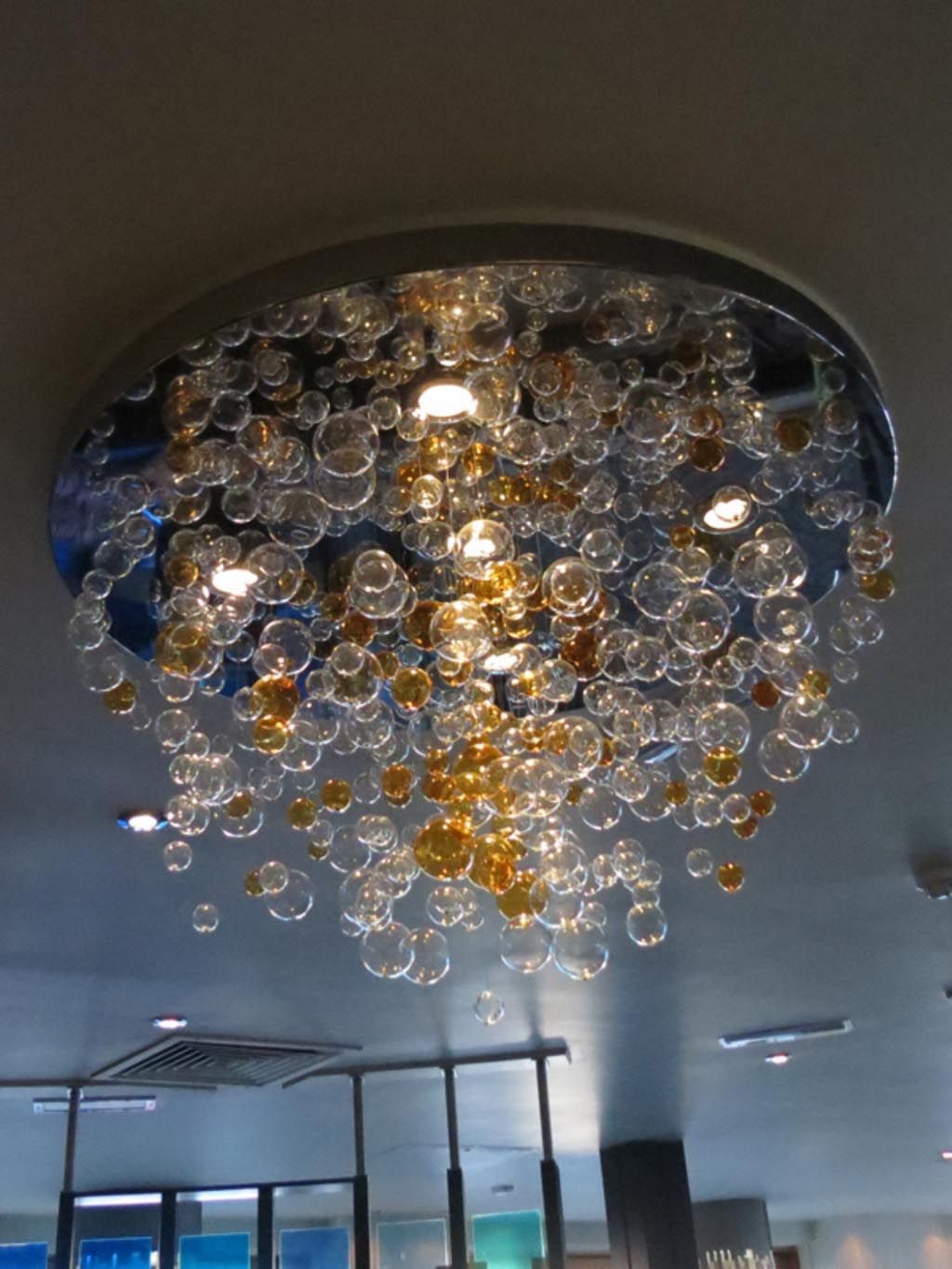 Charming Lightness Of A Glass Bubble Chandelier | Light Within Bubbles Clear And Natural Brass One Light Chandeliers (View 11 of 15)