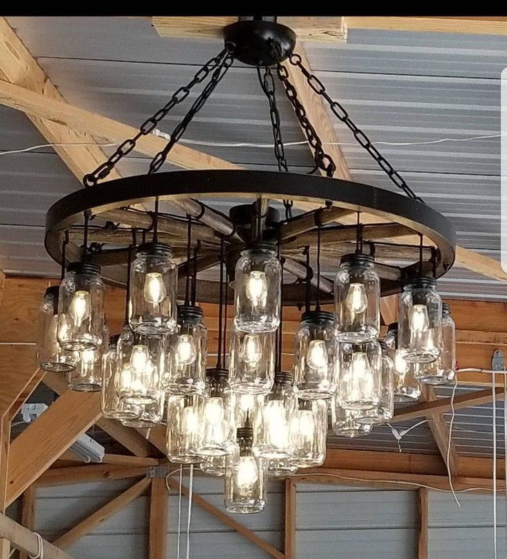 A Wagon Wheel Chandelier With A Mix Of Rustic/vintage With Regard To Wagon Wheel Chandeliers (View 5 of 15)