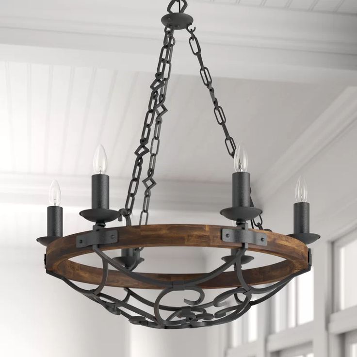 Three Posts Bacchus 6 Light Candle Style Wagon Wheel Intended For Brass Wagon Wheel Chandeliers (View 12 of 15)