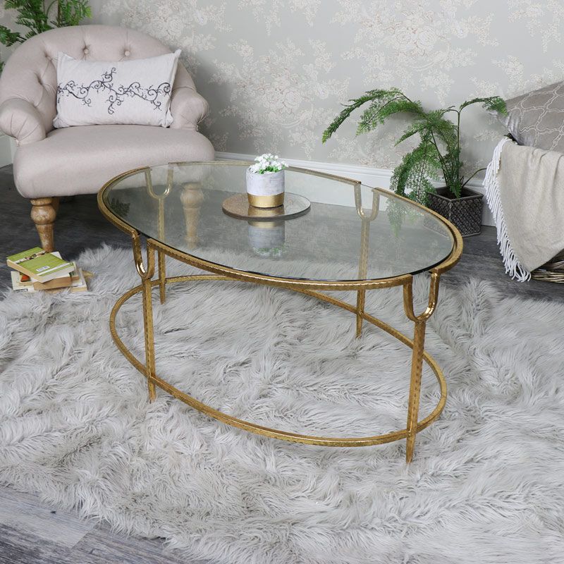 Large Gold Oval Glass Topped Coffee Table | Flora Furniture Regarding Antique Gold And Glass Coffee Tables (Photo 2 of 15)