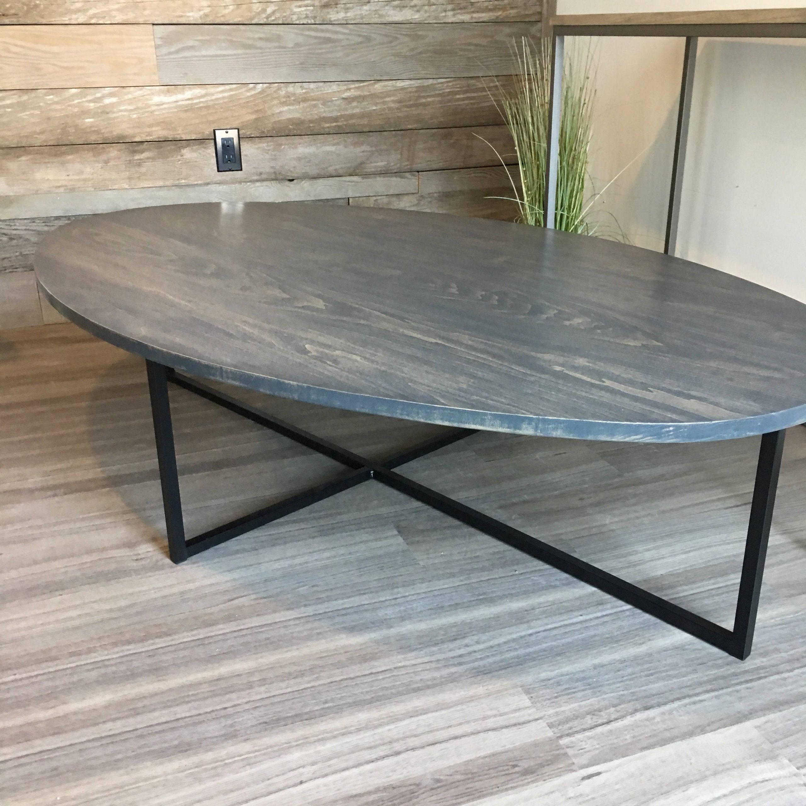 Oval Coffee Table In Dark Grey Stain With Black Steel Base With Regard To Gray Driftwood And Metal Coffee Tables (View 7 of 15)