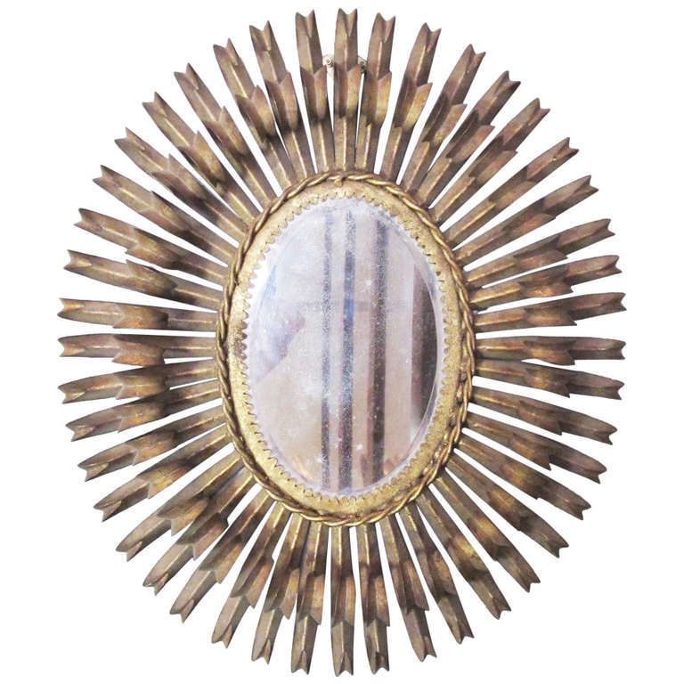 Gilt Metal Oval Spanish Eyelash Mirror | From A Unique Collection Of Within Brass Sunburst Wall Mirrors (View 1 of 15)
