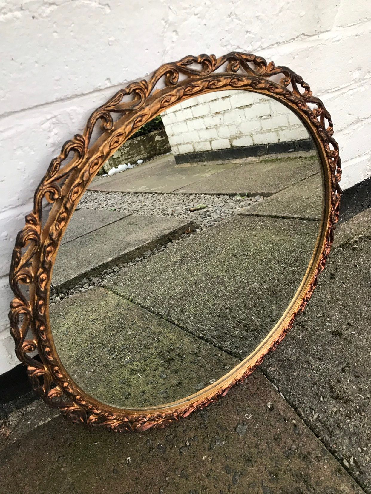 Gold Ornate Metal Mirror With Round Glass, Very Unusual Round Mirror Within Round Metal Luxe Gold Wall Mirrors (View 15 of 15)