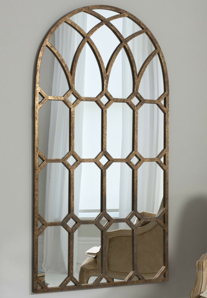 Khadra Extra Large Vintage Aged Bronze Metal Arched Window Wall Mirror Pertaining To Bronze Arch Top Wall Mirrors (Photo 1 of 15)