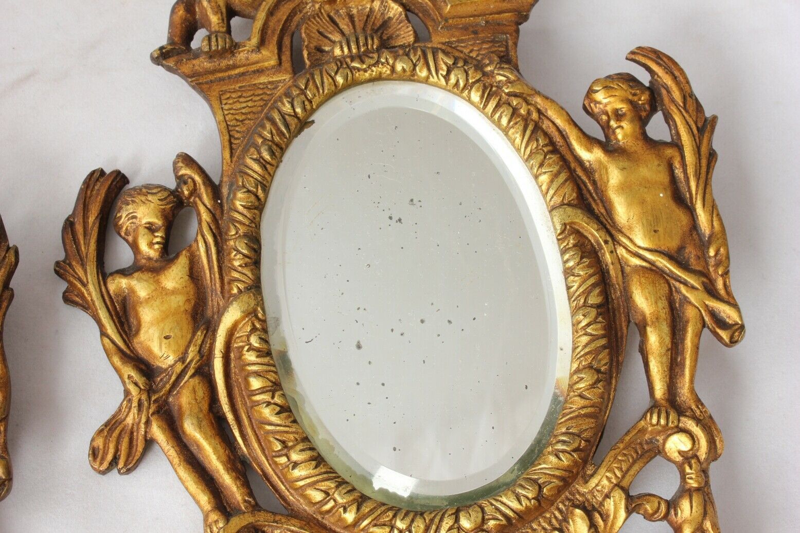 Pair Small Oval 19th Century French Gilt Brass Cherub Wall Mirrors (View 11 of 15)