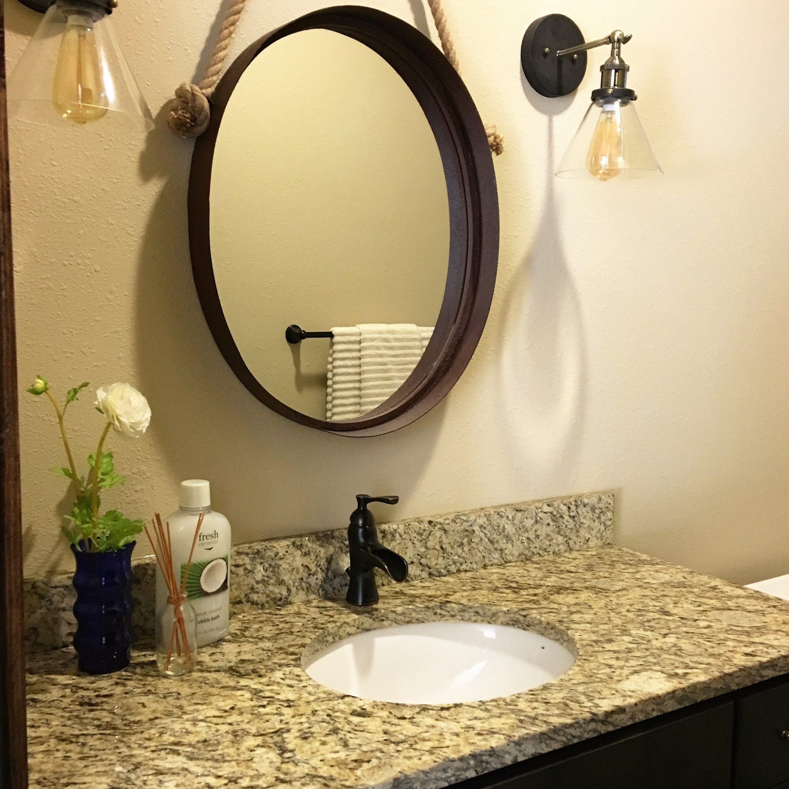 Unique Mirror And Sconce Combo To Customize This Bathroom (View 8 of 14)