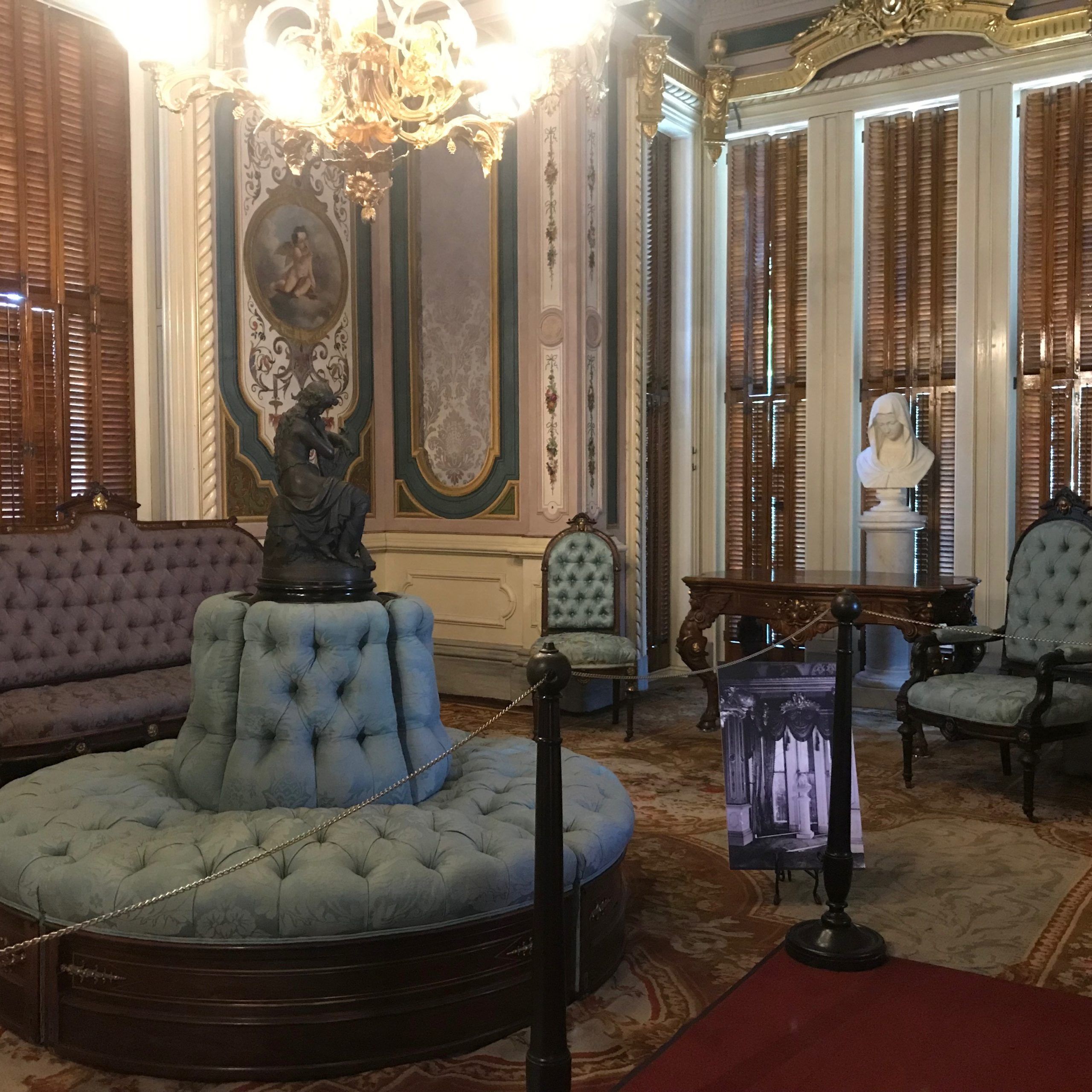 The Bourne Identity: What Was The Ottoman For, And Where Does It Belong? –  Victoria Mansion In Brown Wash Round Ottomans (View 8 of 15)