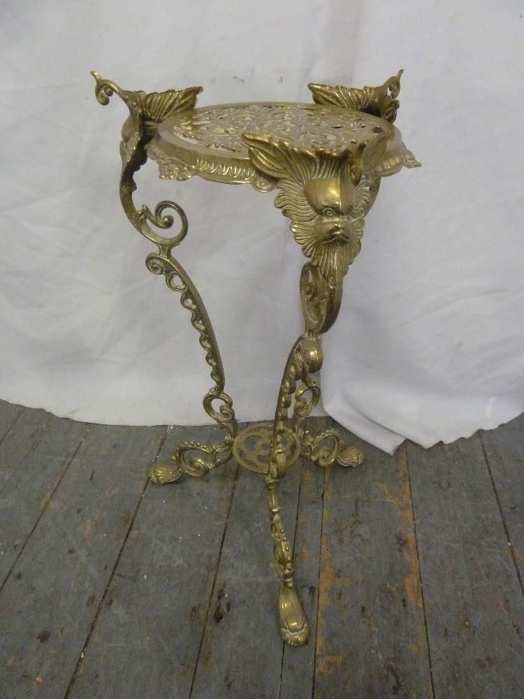 A Brass Plant Stand On Three Outswept Legs Decorated With Scrolls, Leaves  And Flowers Within Brass Plant Stands (View 14 of 15)