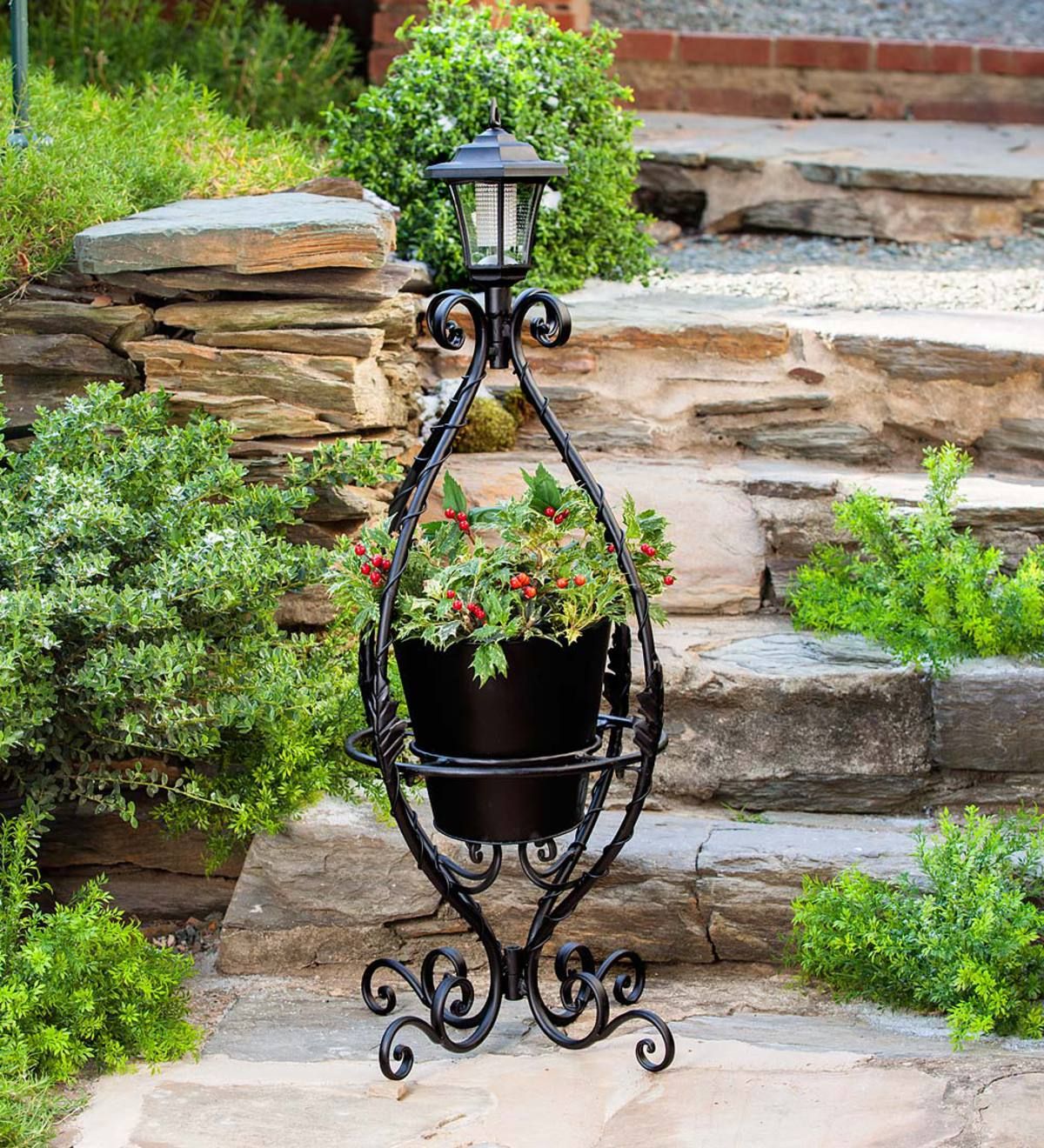 Black Wrought Iron Plant Stand With Solar Light | Wind And Weather For Wrought Iron Plant Stands (View 4 of 15)