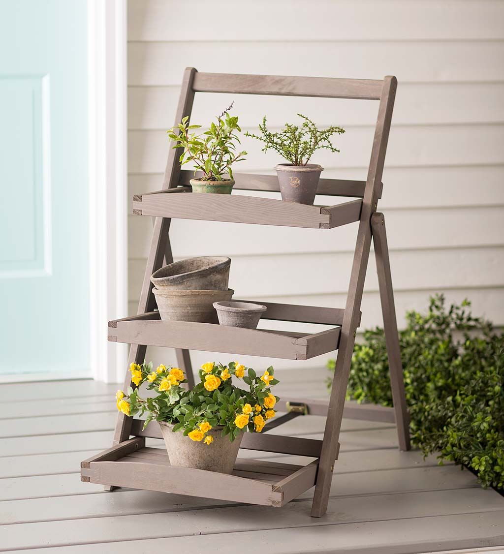 Folding Three Shelf Wooden Plant Stand In Gray Finish | Wind And Weather Regarding Weathered Gray Plant Stands (View 4 of 15)