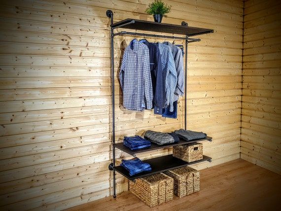 Featured Photo of 15 Collection of Built-in Garment Rack Wardrobes