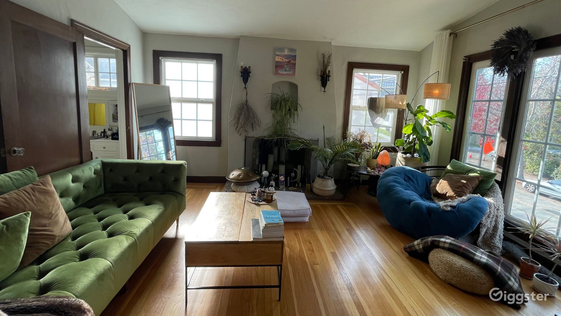 Floor To Ceiling Windows Plant Filled Boho Vibes | Rent This Location On  Giggster Inside Cozy Castle Boho Living Room Tables (View 14 of 15)