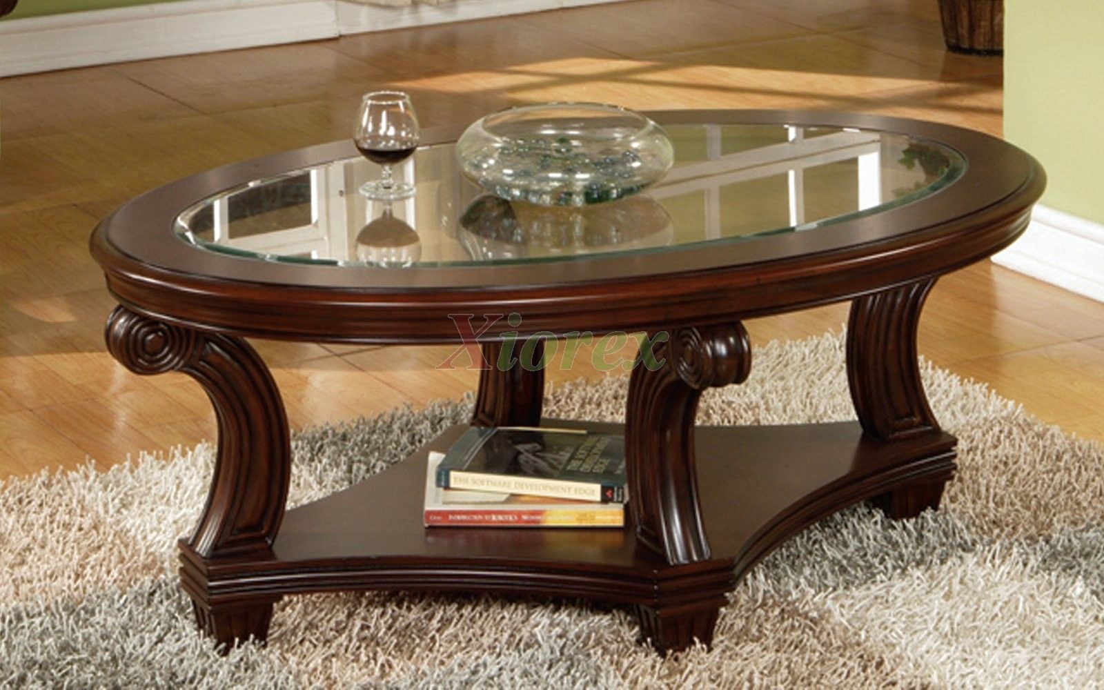 Perseus Glass Top Oval Coffee Table Montreal | Xiorex Within Glass Coffee Tables With Lower Shelves (View 14 of 15)